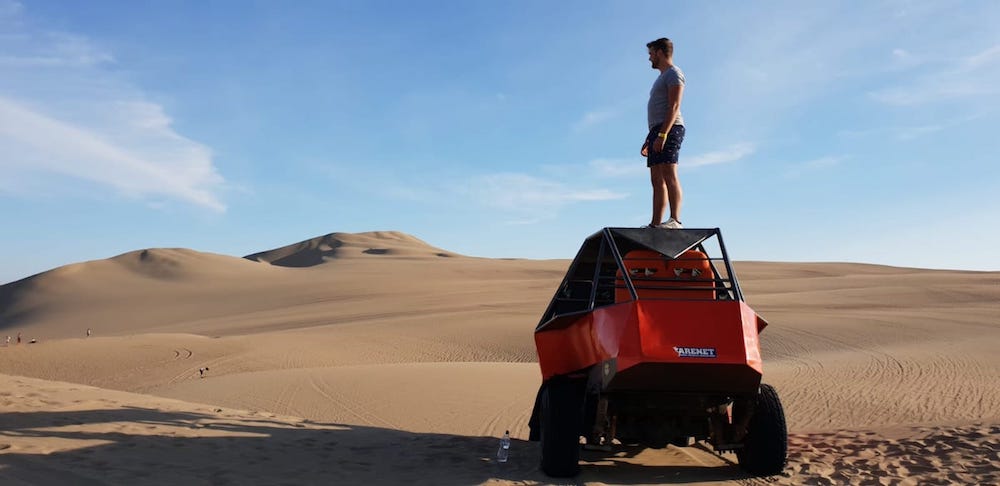 Sandboarden Huacachina Peru buggy tour